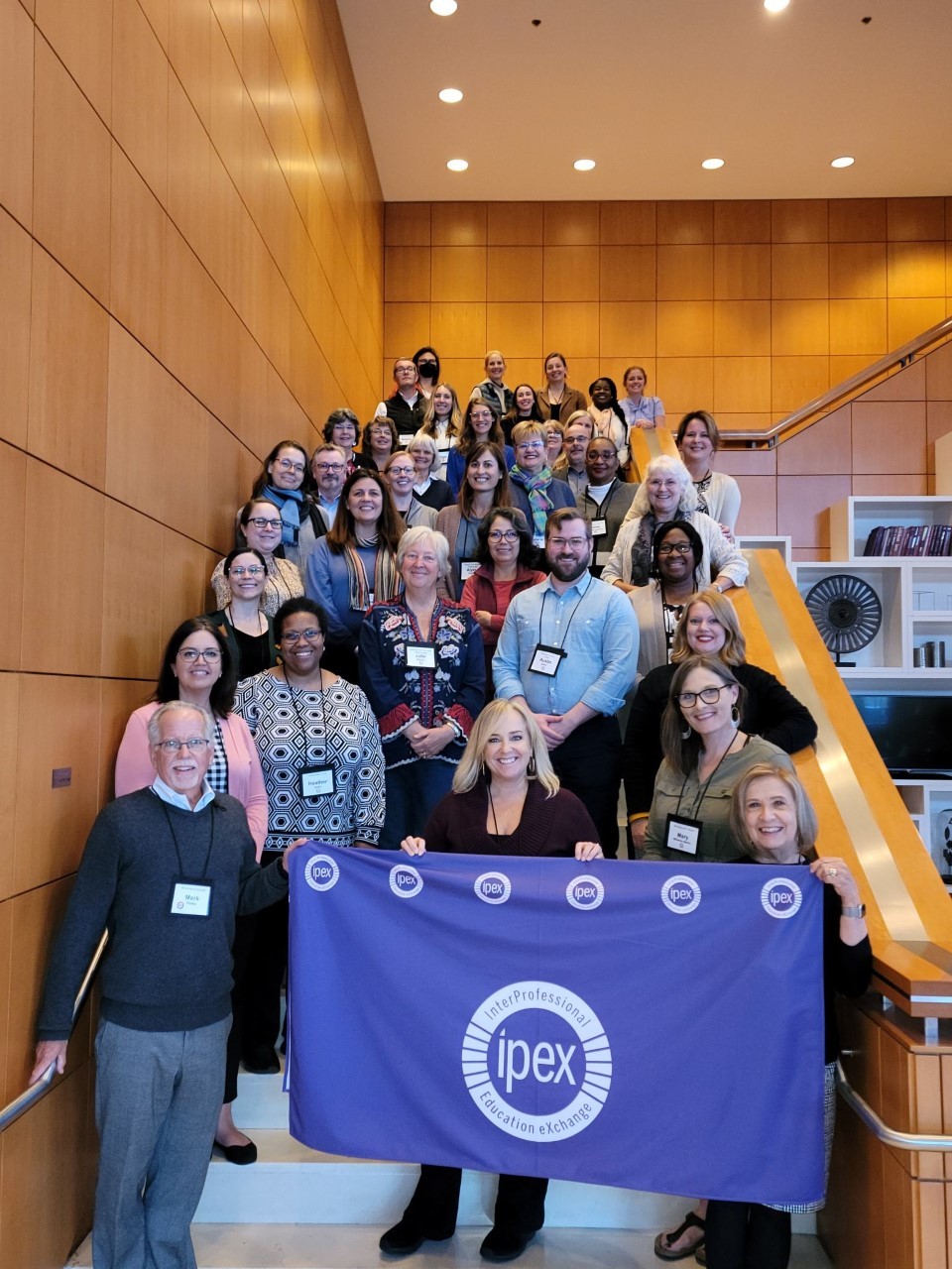 A group of health professionals poses at a summit in Chicago