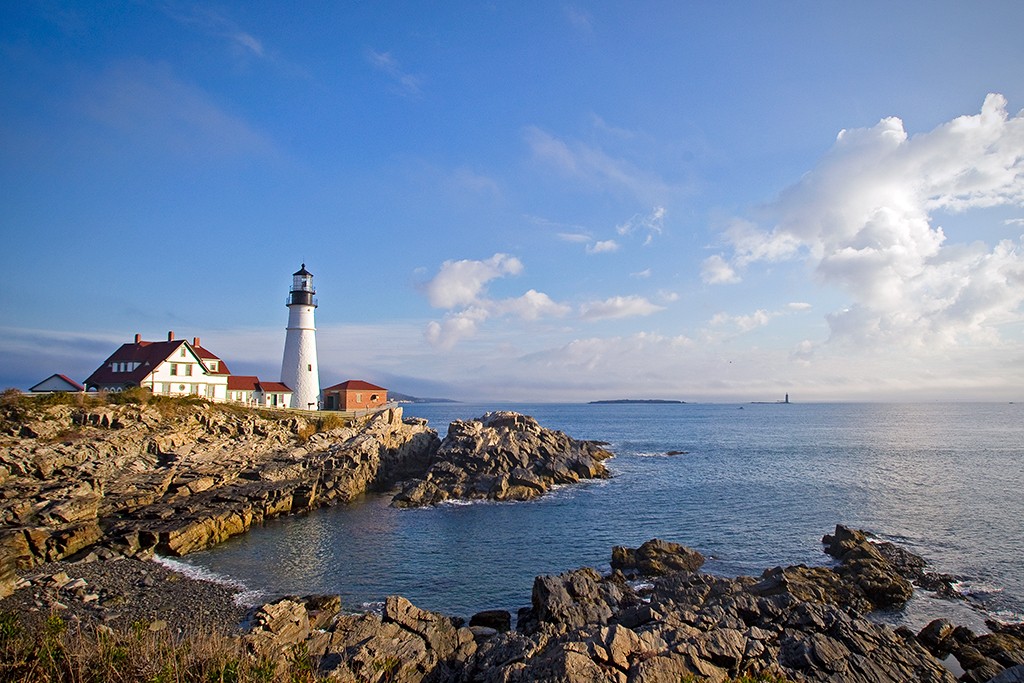 The Portland Head Light on the rocky coast of Maine overlooking the ocean