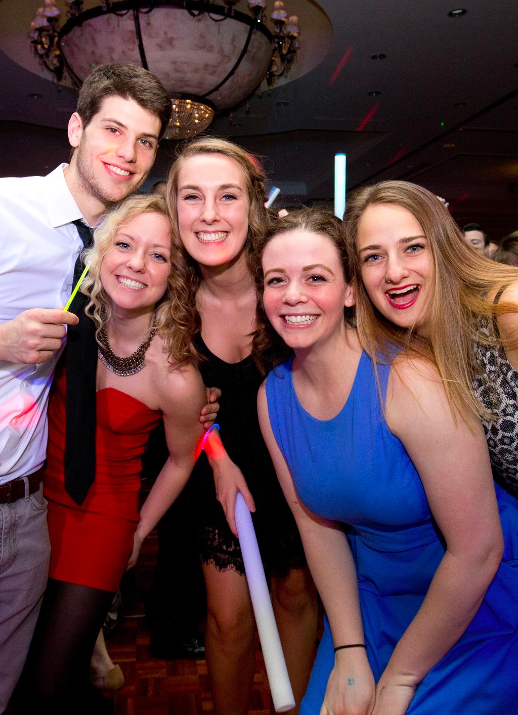 Five students at a formal U N E dance