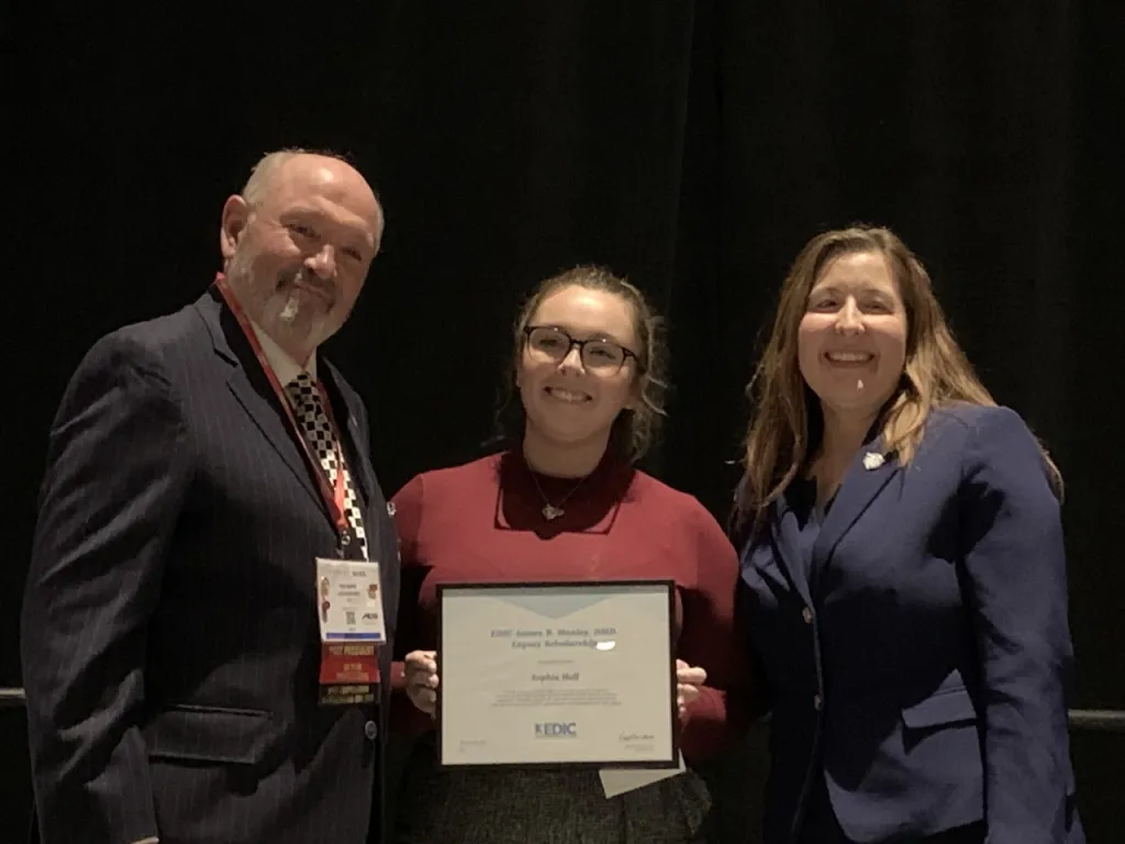 Dr. LoGuercio and Dean Kimmes present Sophia Hall with an award