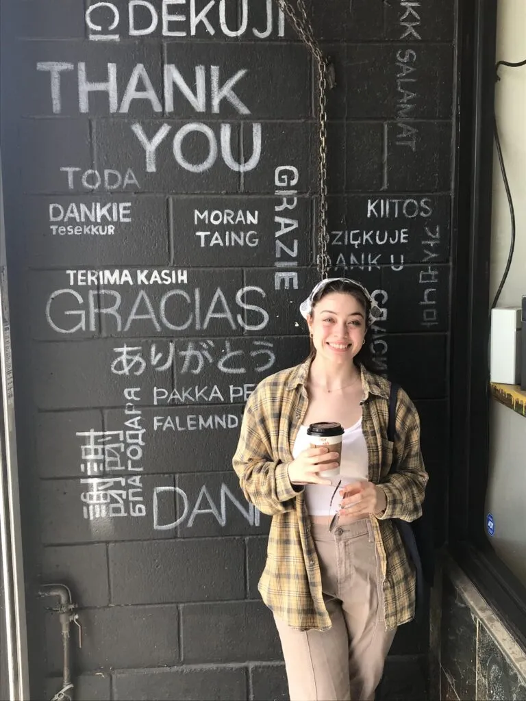 Photo of Aubrey Sahouria ’22 in a coffee shop