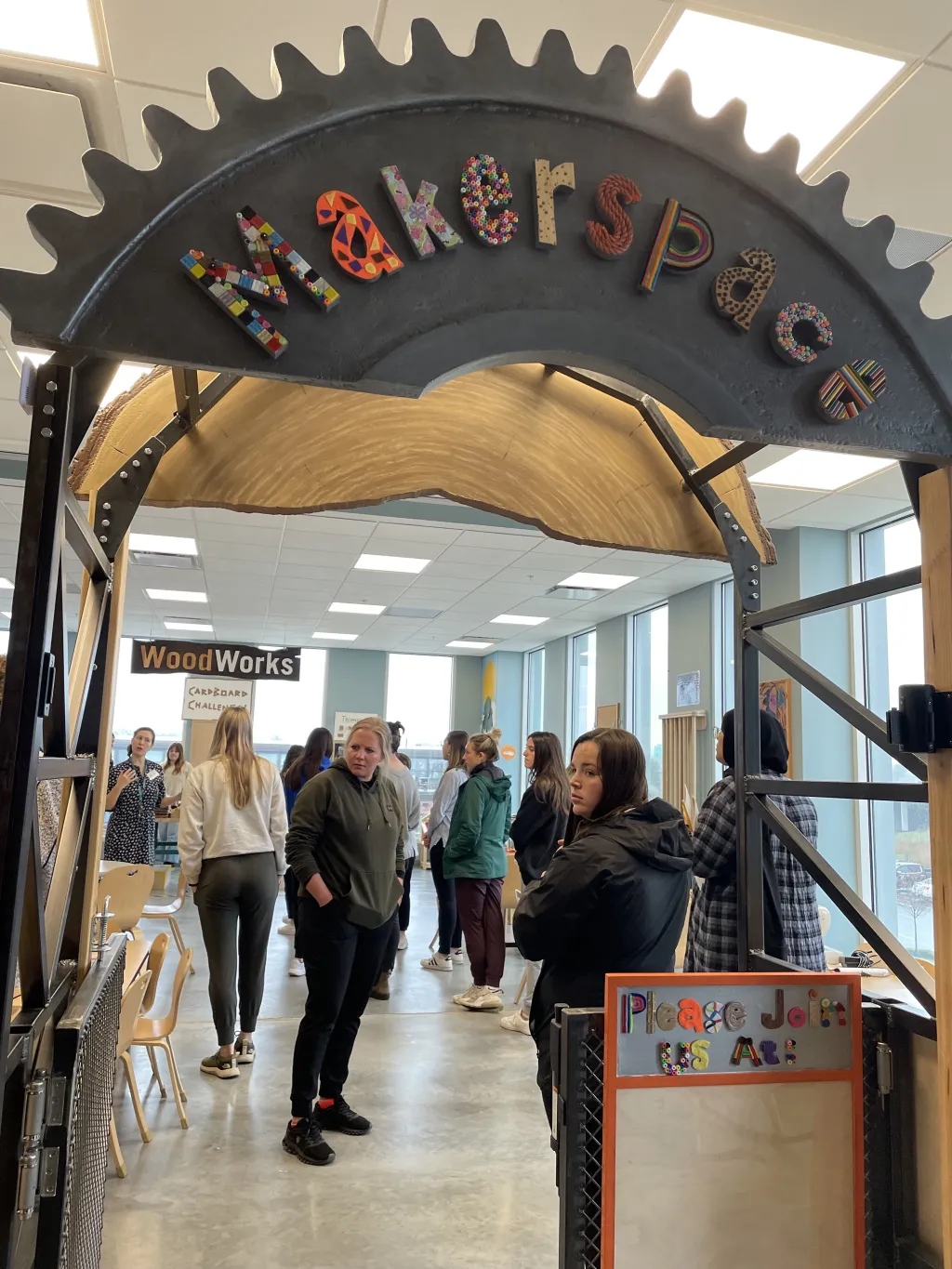 Students gather in the makerspace area of the Children's Museum 