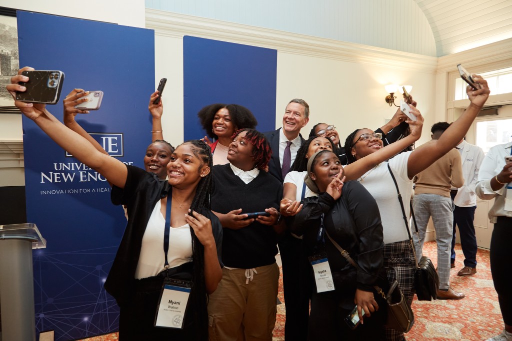 Cheyney University students take selfies with President James Herbert