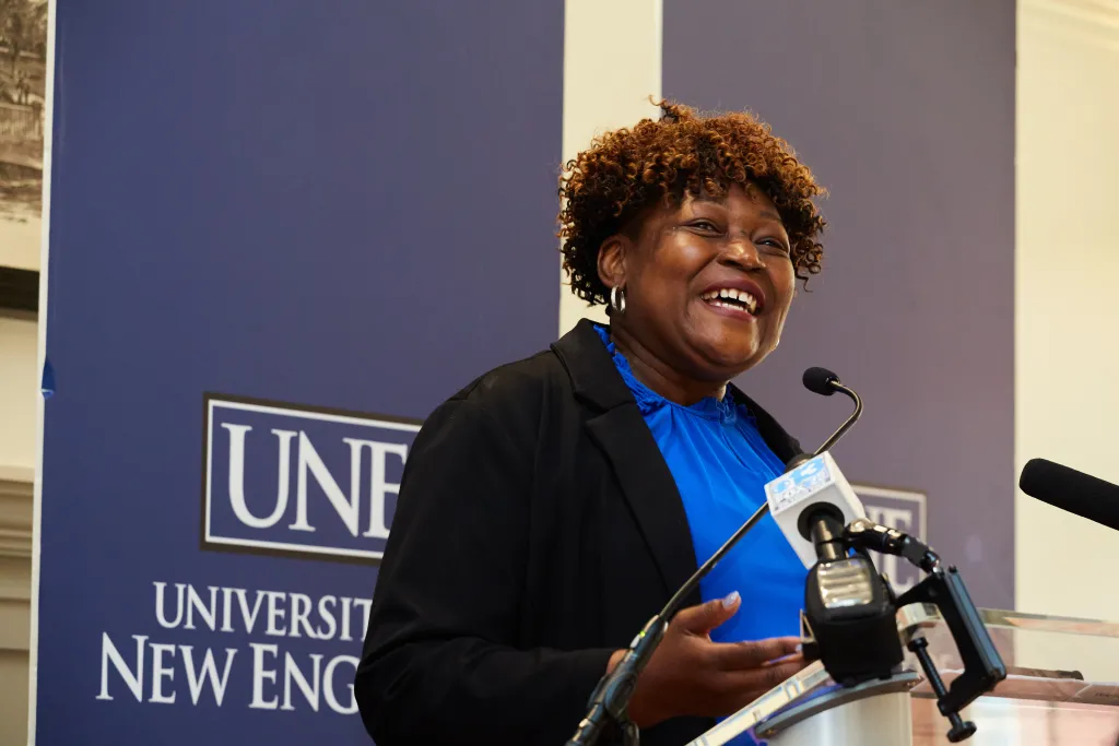 Vanessa Atkins speaks into the microphone