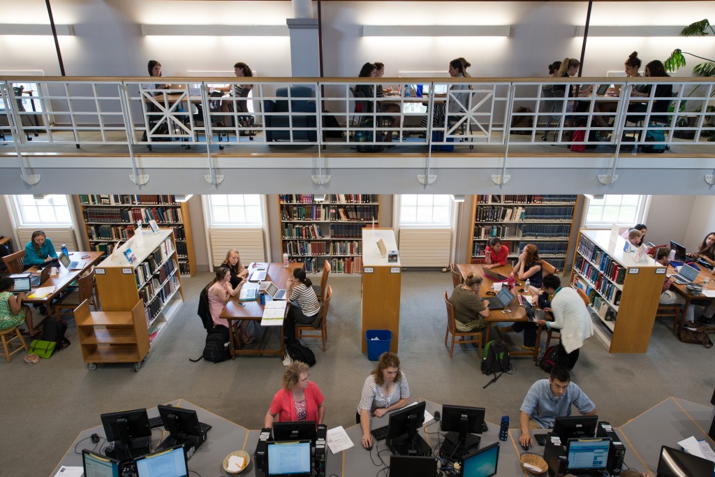 Interior of the Abplanalp Library with students at desks studying
