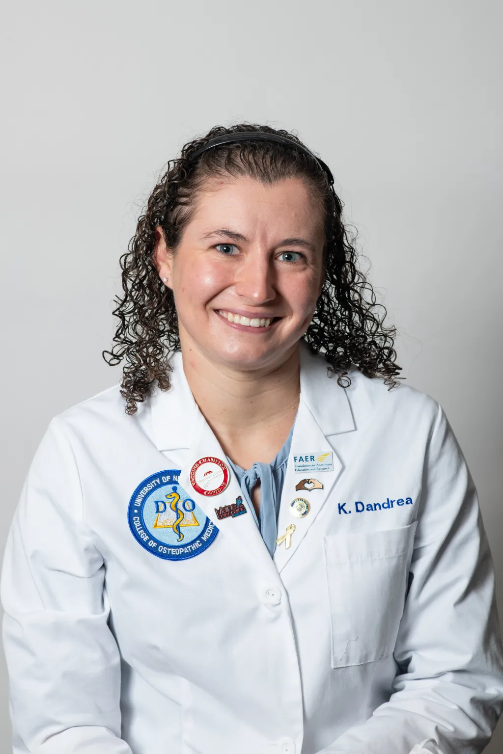 Portrait of Kaye Dandrea in white doctor's coat