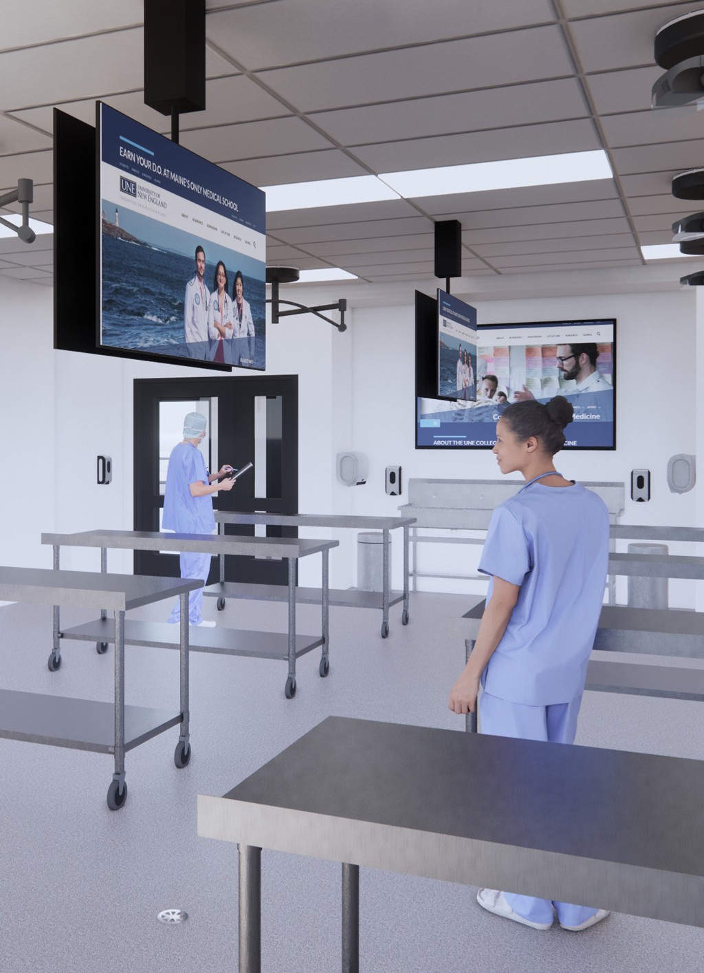 A rendering of the upcoming anatomy lab in the new C O M building showing tv screens and silver tables
