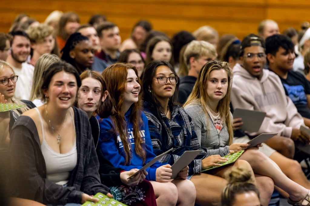 A group of undergraduate students sitting in the Alfond Forum