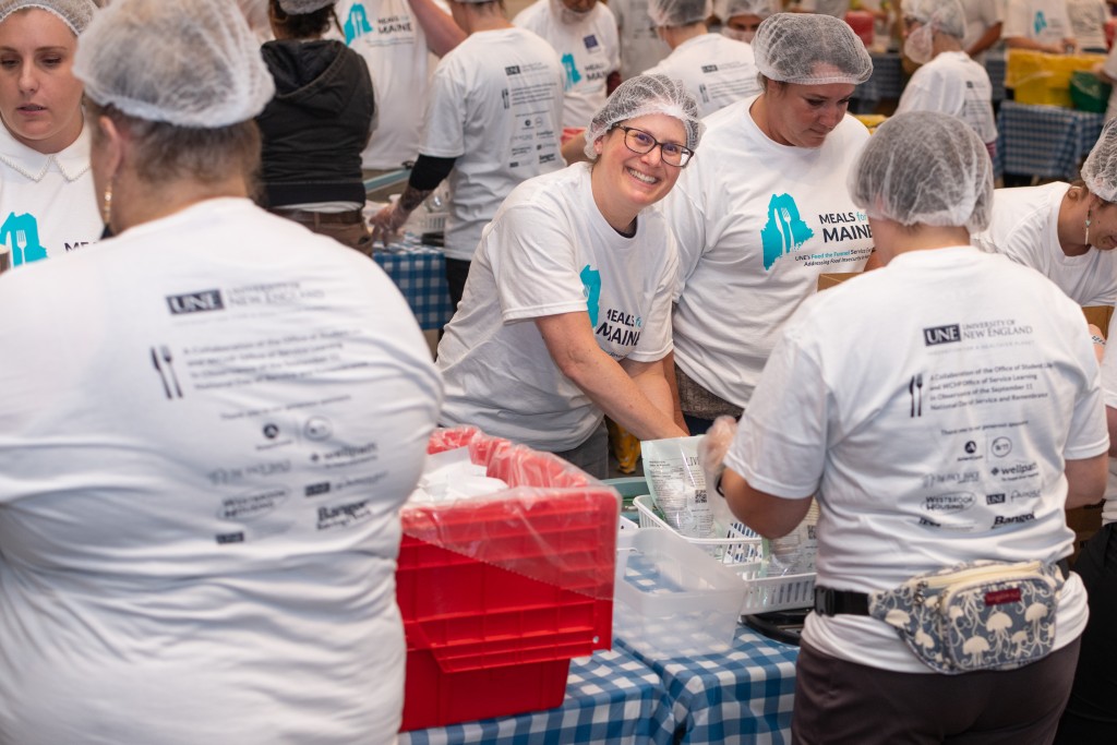 U N E employees participate in the Meals for Mainers event