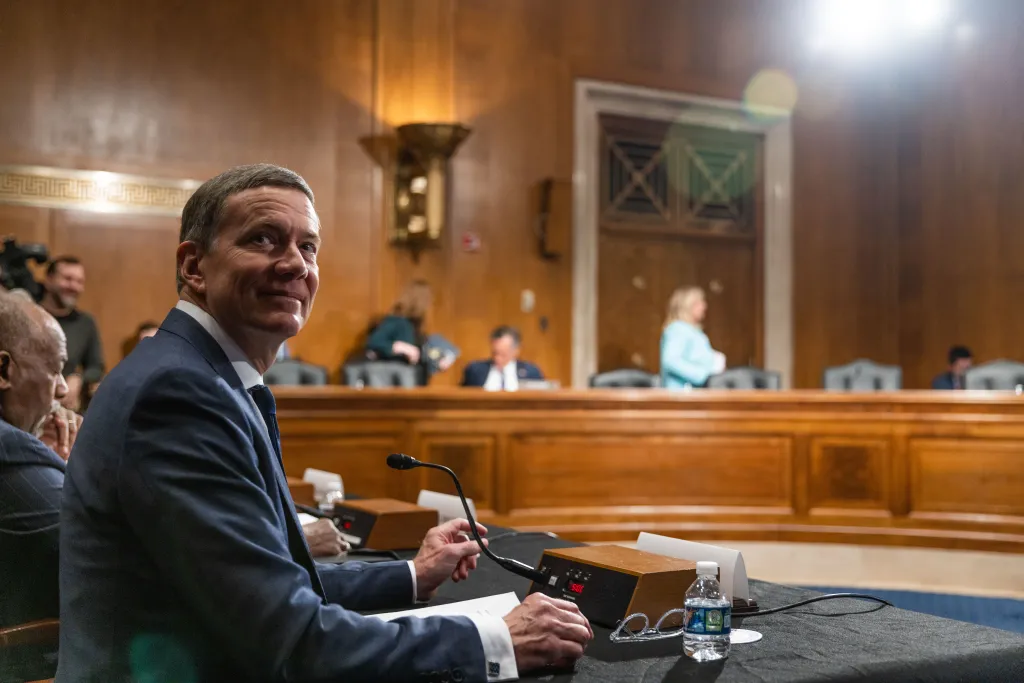 UNE President James Herbert in a Congressional chamber during testimony