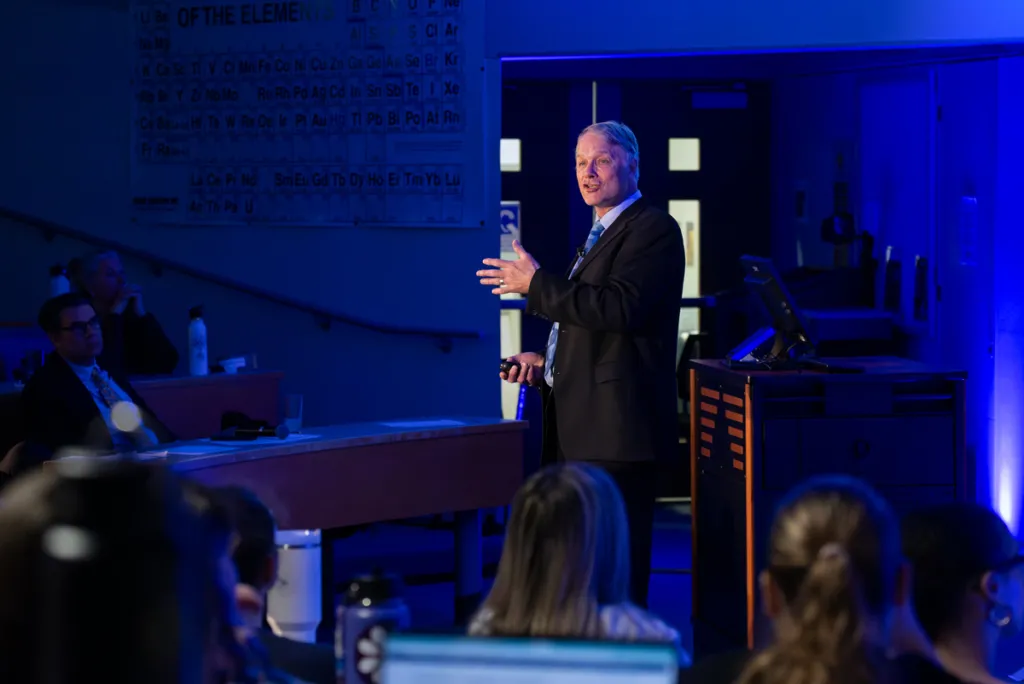 Cameron Wake presents at a lecture on climate change