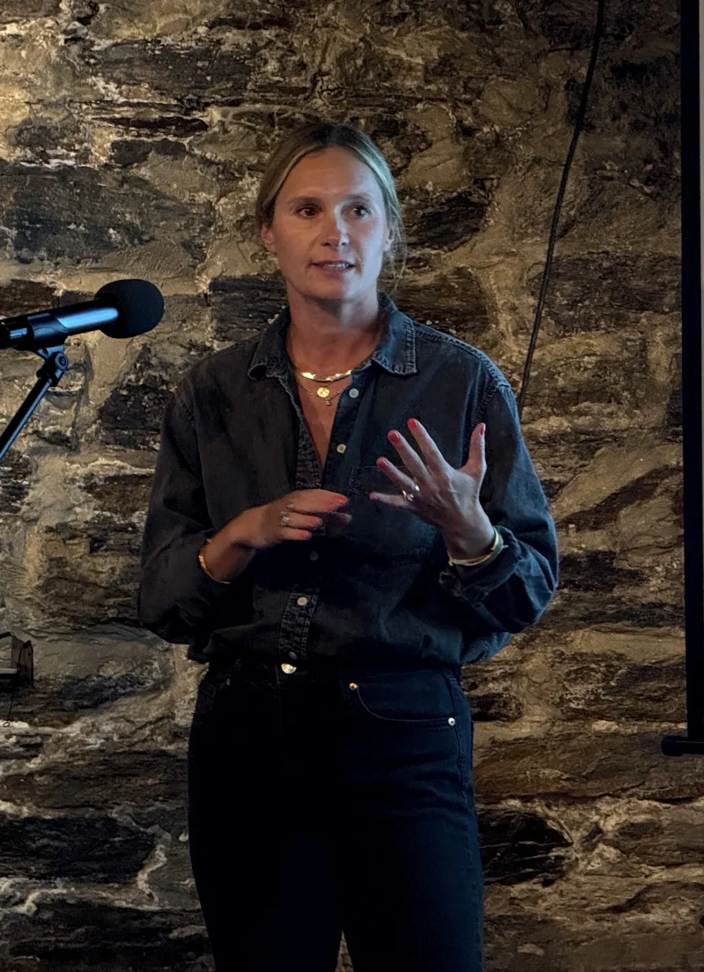 Peterson speaks at the microphone