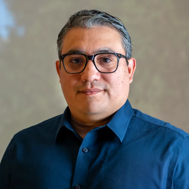 Headshot of Luis Queme