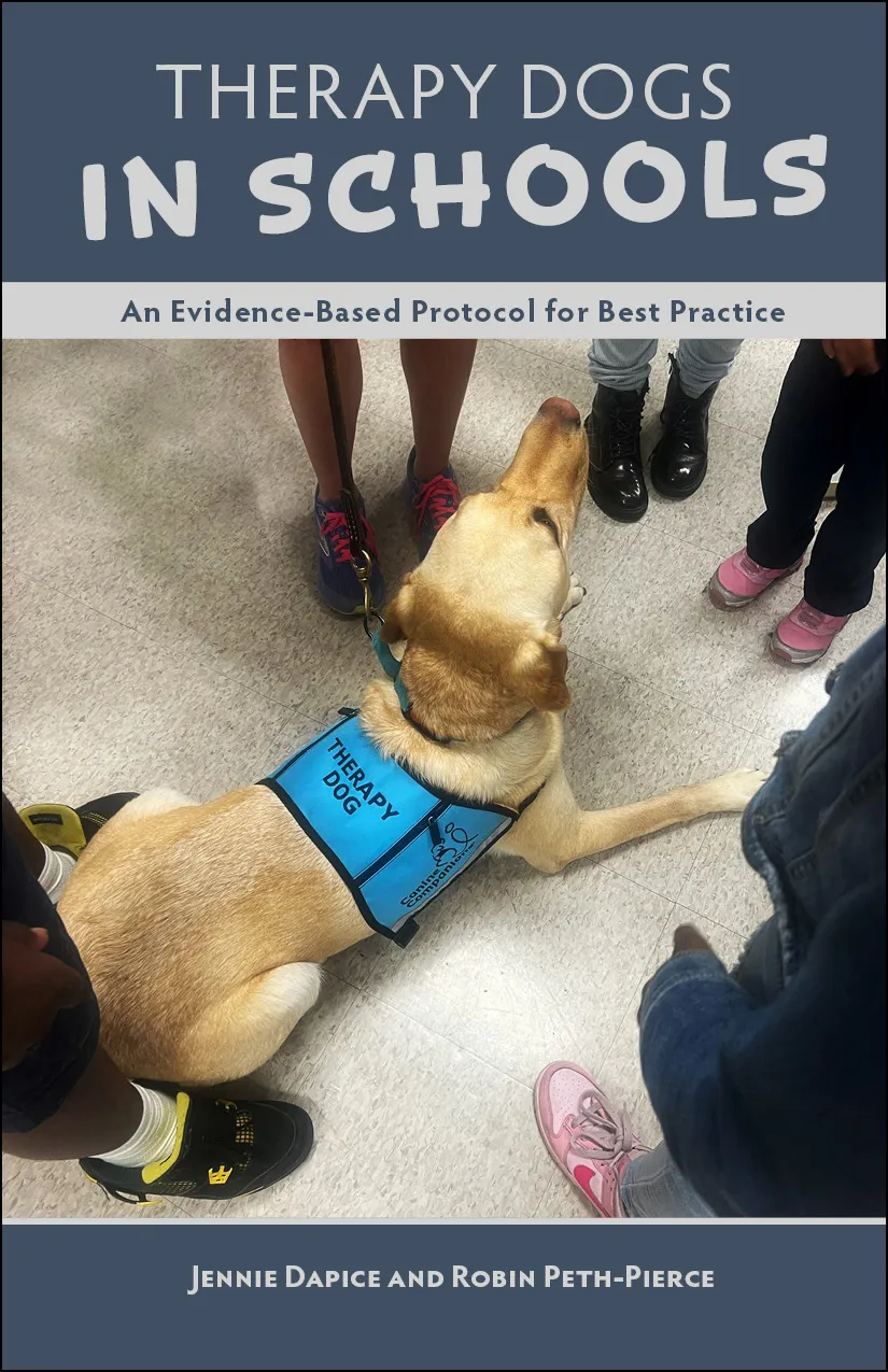 UNE professor co-authors first evidence-based guide for school therapy dog programs