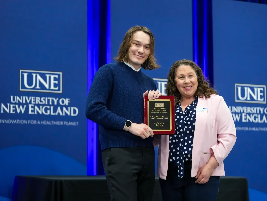 student accepting award at UNE's 2026 annual University Awards