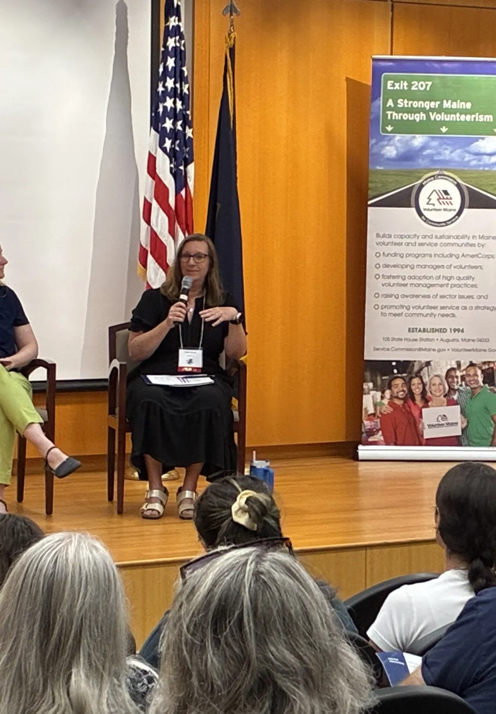Trisha Mason speaks in a panel presentation onstage