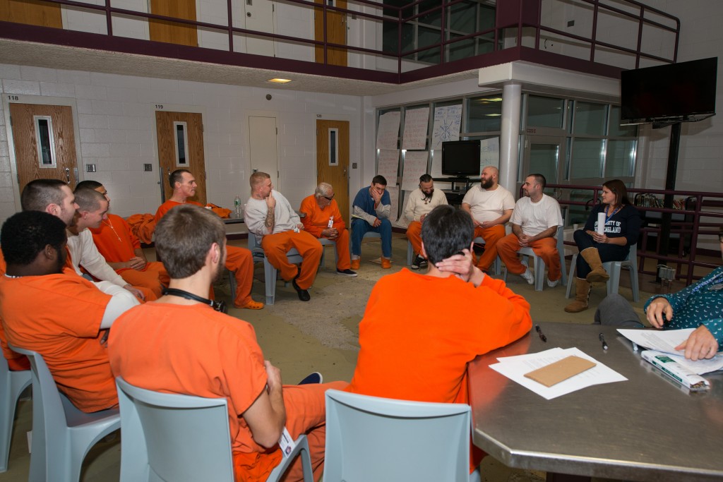U N E students meet with prisoners at the Cumberland County Jail