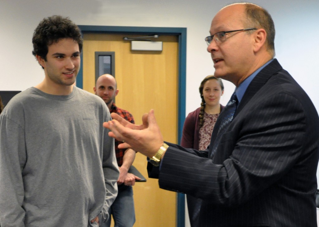 Matthew Scheuer (left) and Tom LeBlond discuss Scheuer's Pratt & Whitney Fellowship research.