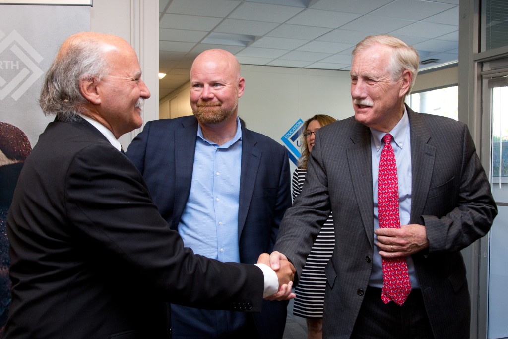 UNE NORTH Executive Director Barry Costa Pierce shakes hands with Senator Angus King