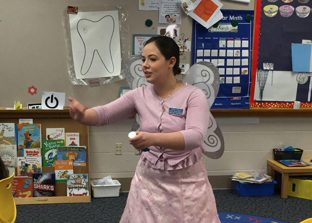 UNE's dental hygiene tooth fairy visits with students
