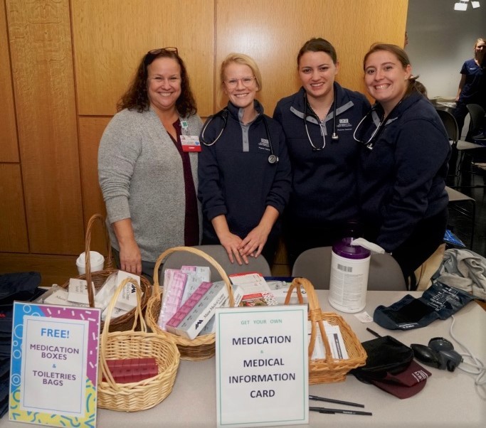 Twenty-six UNE students joined professional providers at the community health fair