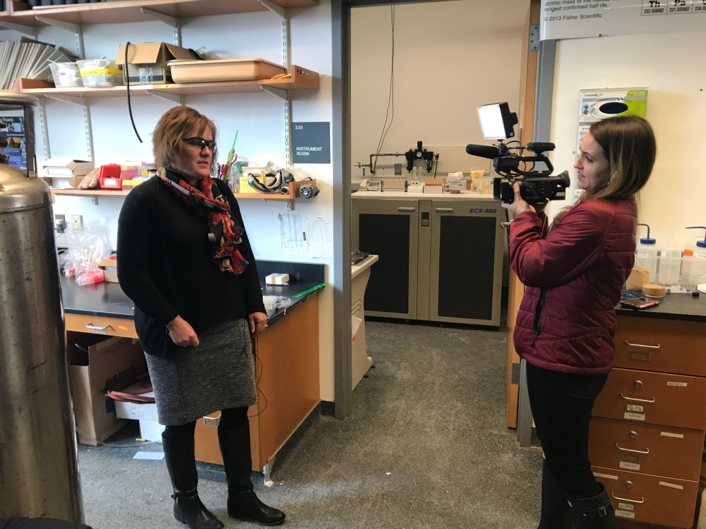 Amy Deveau being interviewed by WCSH's Lindsey Mills in the chemistry lab