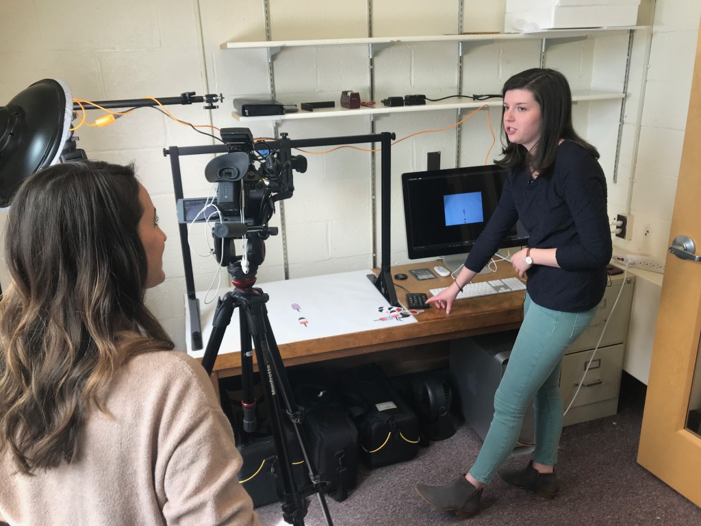 Emily Ferrick explains the process of making stop animation videos to WCSH's Lindsey Mills