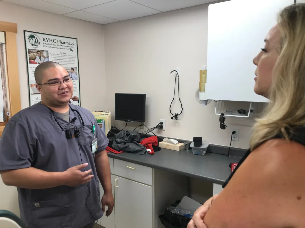 Millinocket Dentist C.J. Castonguay being interviewed by WCSH's Vivien Leigh