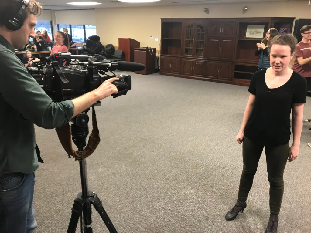 WCSH photojournalist Devon Crawford captures Autumn Stupca rehearsing