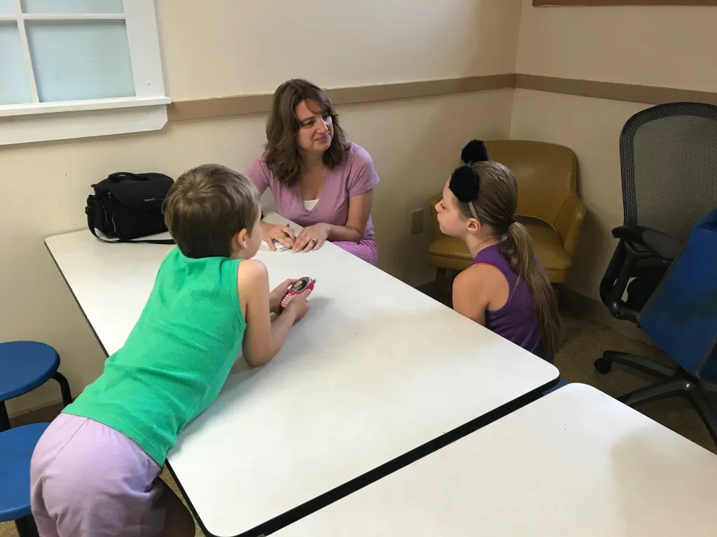 Journal Tribune reporter Liz Gotthelf interviews two campers