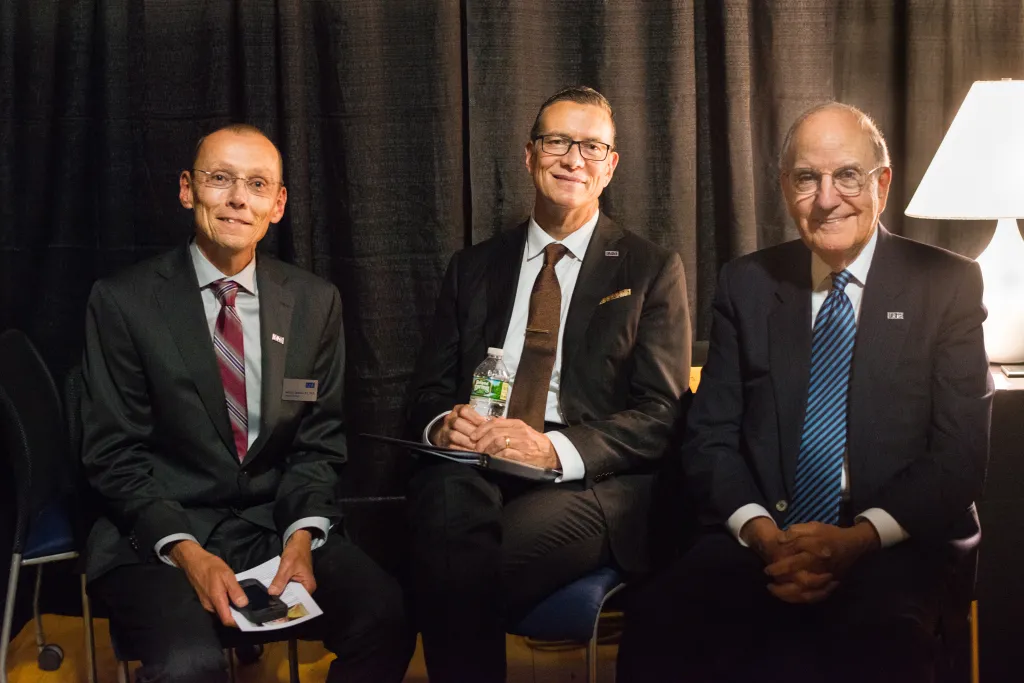 Interim Provost Mike Sheldon, President James Herbert, and Senator George Mitchell