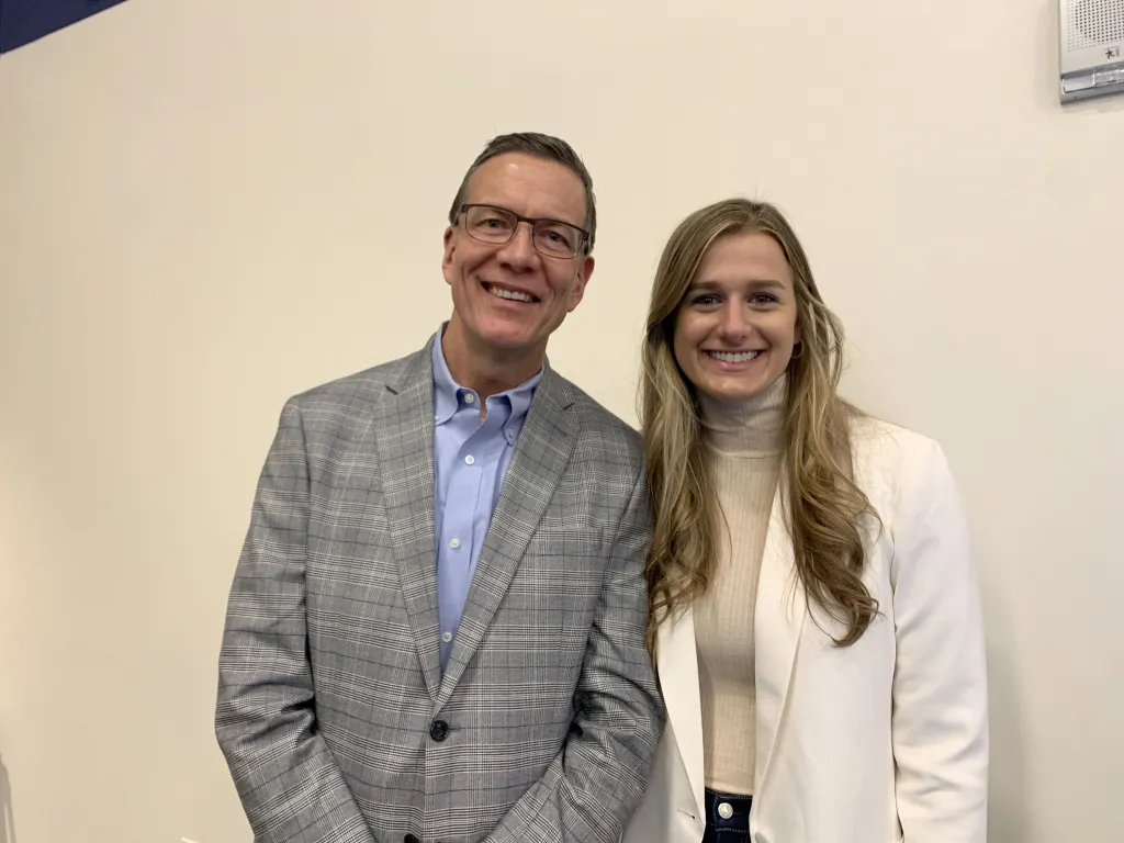 UNE President James Herbert and former USC volleyball athlete and motivational speaker Victoria Garrick.