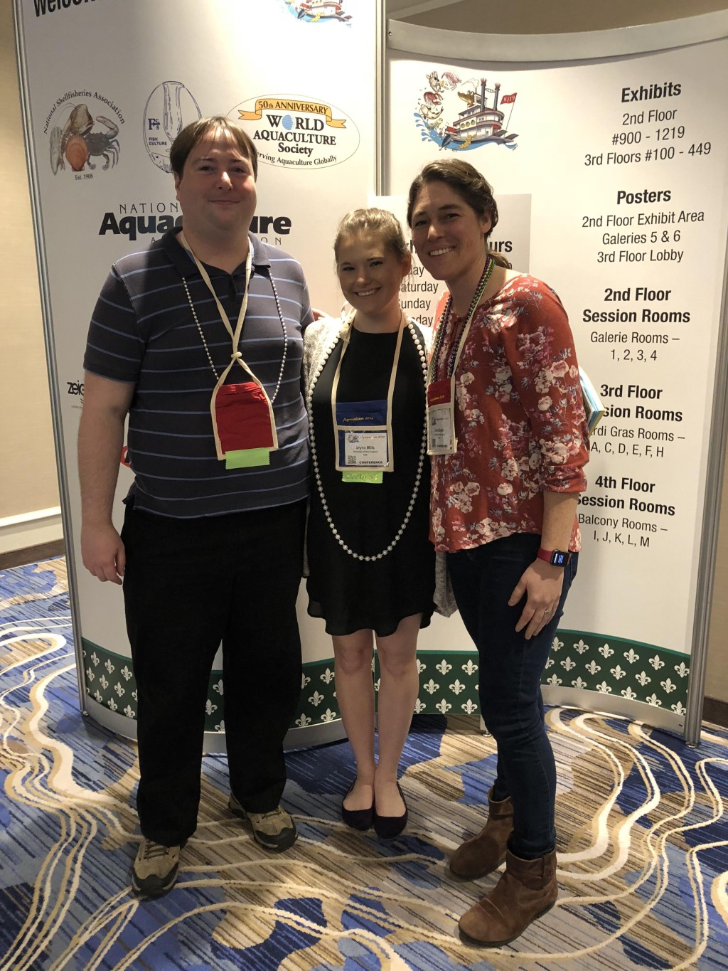 Students Adrianus Both and Erynn Mills with Carrie Byron at Aquaculture 2019