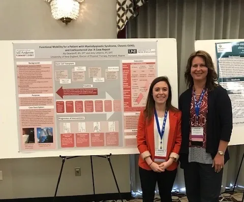 Alyssa Deardorff and Amy Litterini with the poster of Deardorff's case report