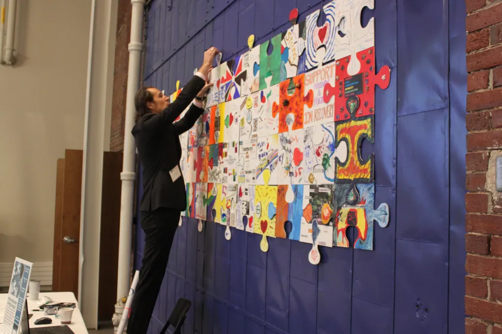 UNE Social Work student Glenn Simpson’s work, “The Puzzle Project,” was on display.