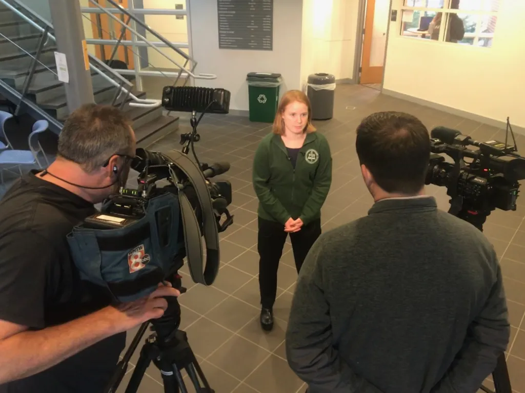 COM student Lucy Algeo being interviewed by WMTW and WGME