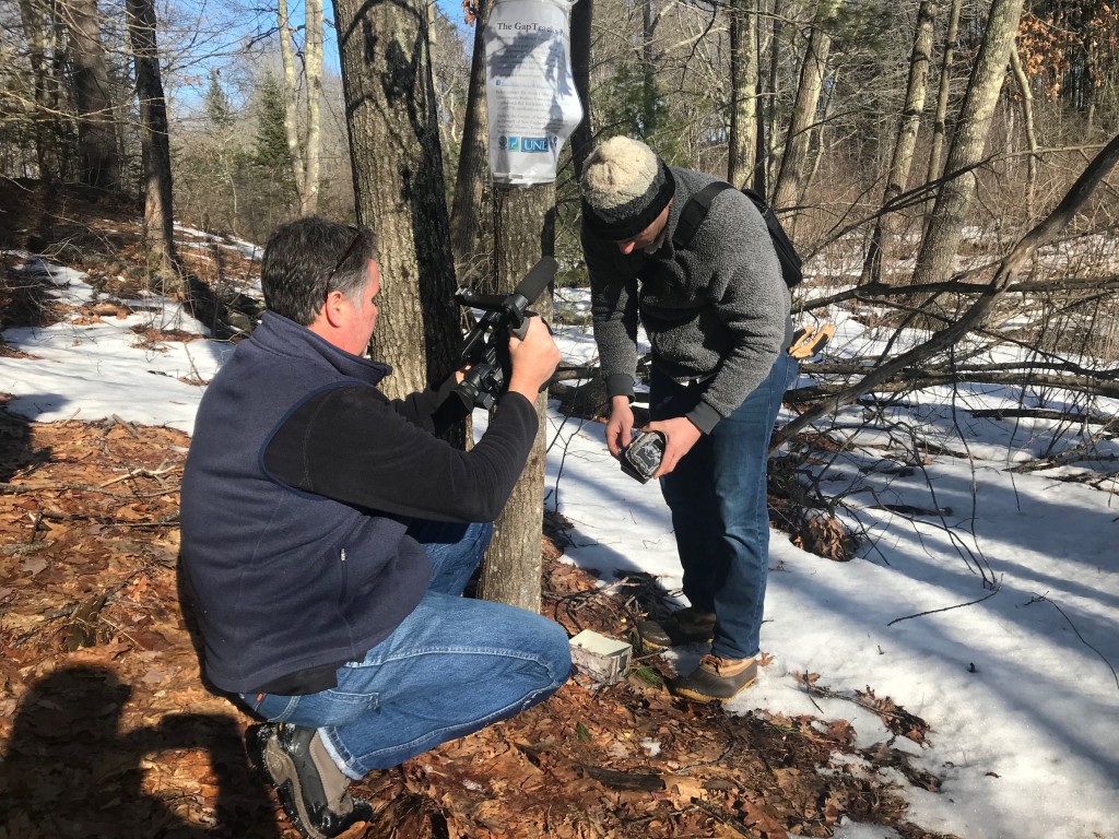 A WMTW videographer captures Noah Perlut gathering data from his camera
