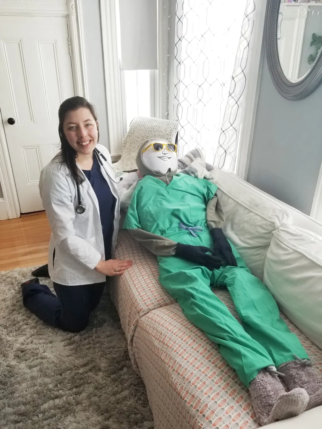 Lily Prior (M.S.P.A., ’21) tends to her patient “Bryan,” whose head was fashioned from a ski helmet.