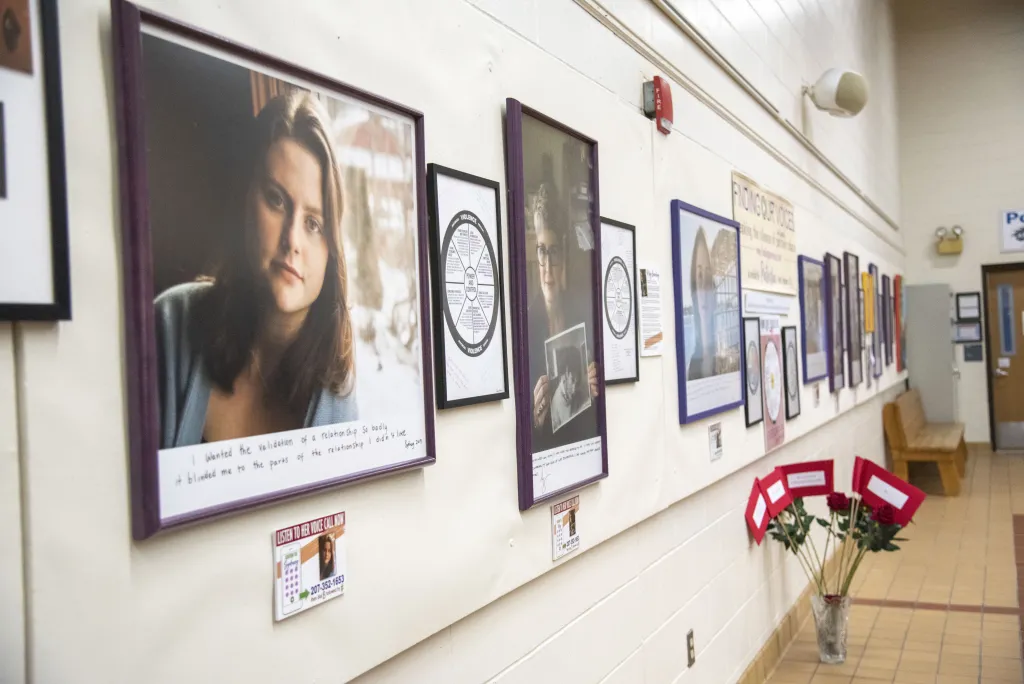The multimedia exhibit, "Finding Our Voices," pairs photos of 21 domestic violence victims