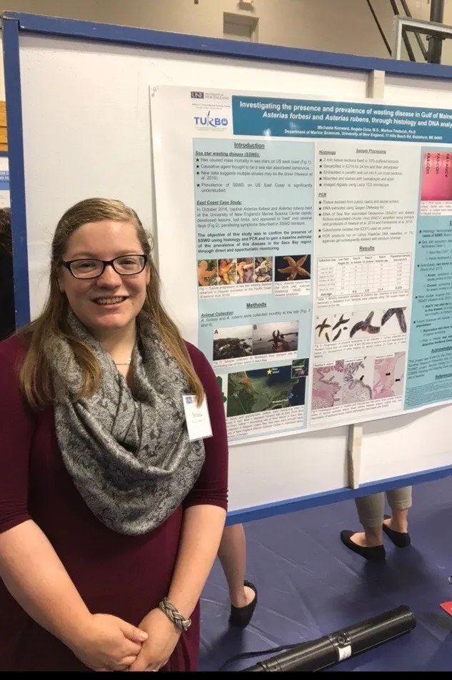 Michaela Kenward with her award winning poster on sea star wasting disese