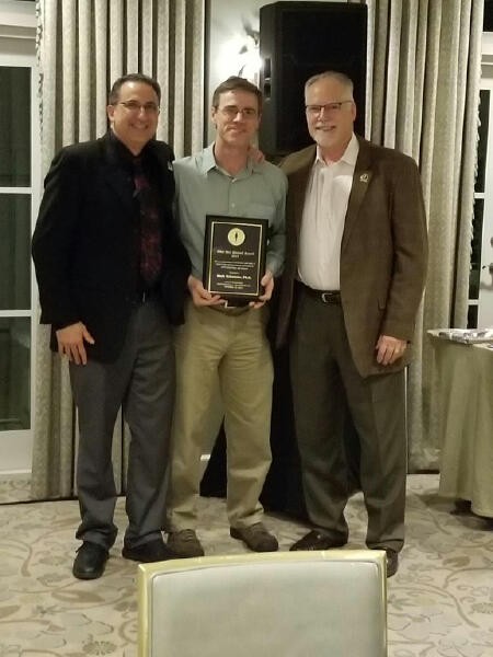 Mark Schuenke received the Silas Weir Mitchell Award in New Orleans at the AENS annual symposium