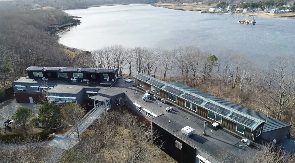 The installation of solar panels on the Marine Science Center is one of several sustainability initiatives at UNE
