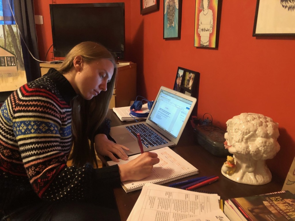 Kayla Thoits is taking a UNE course online while also teaching middle school students remotely