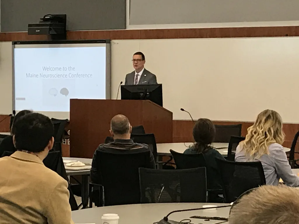 President James Herbert welcome Maine SfN attendees to UNE for their annual meeting