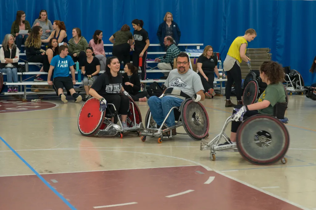Northeast Passage Wildcat Bill Bouffard with UNE students