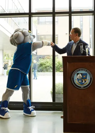 President Herbert fist bumping the updated Stormin' Norman