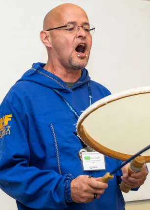 Man plays a musical instrument