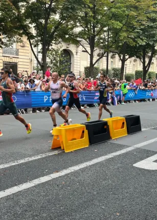 Norm O'Reilly cheers on Olympians in the triathlon