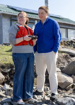UNE team of students and faculty install seismometer on Ram Island