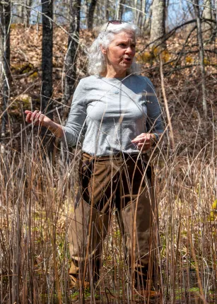 UNE Professor Pam Morgan stands in the vernal pool
